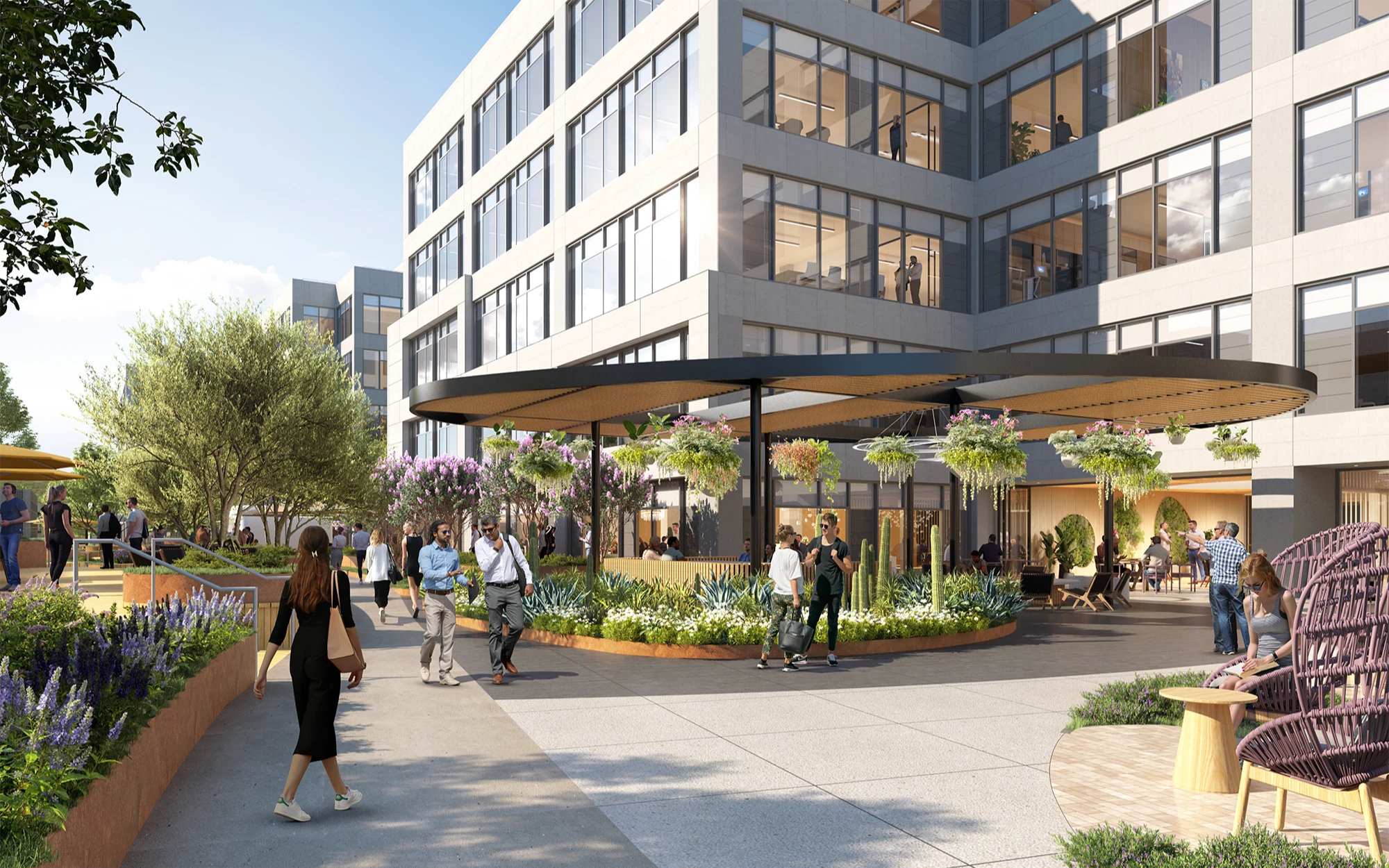 Pedestrian-friendly office plaza with shaded seating, plants, and professionals walking and socializing