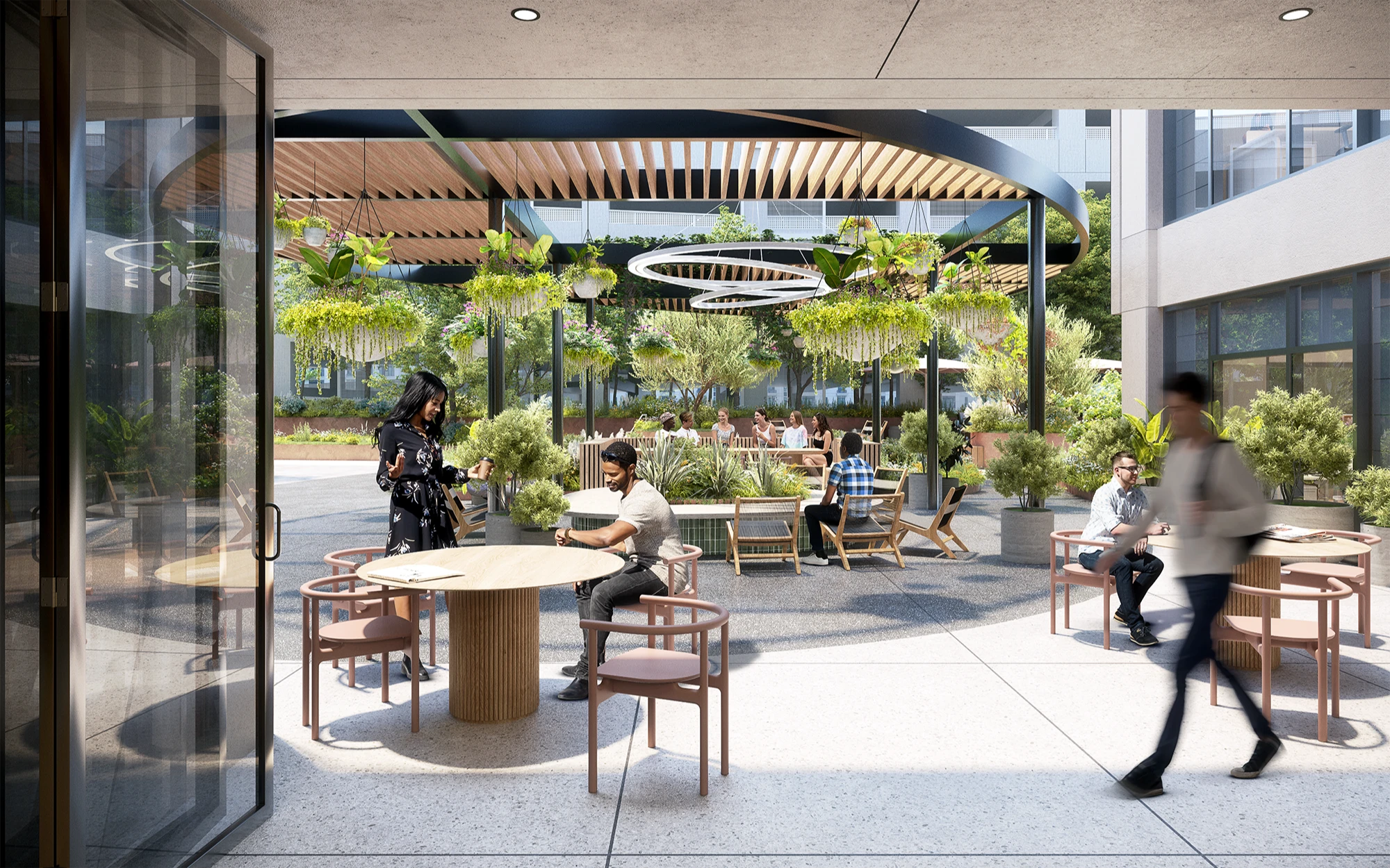 Office courtyard seating area with modern shade structures, lush greenery, and professionals relaxing
